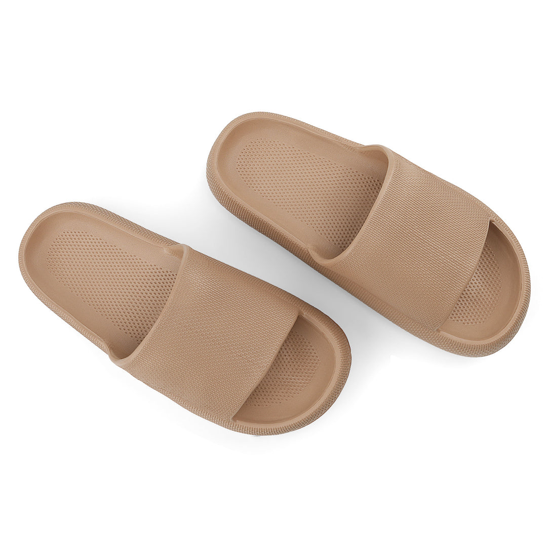 Pair of beige slides on a white background#color_brown