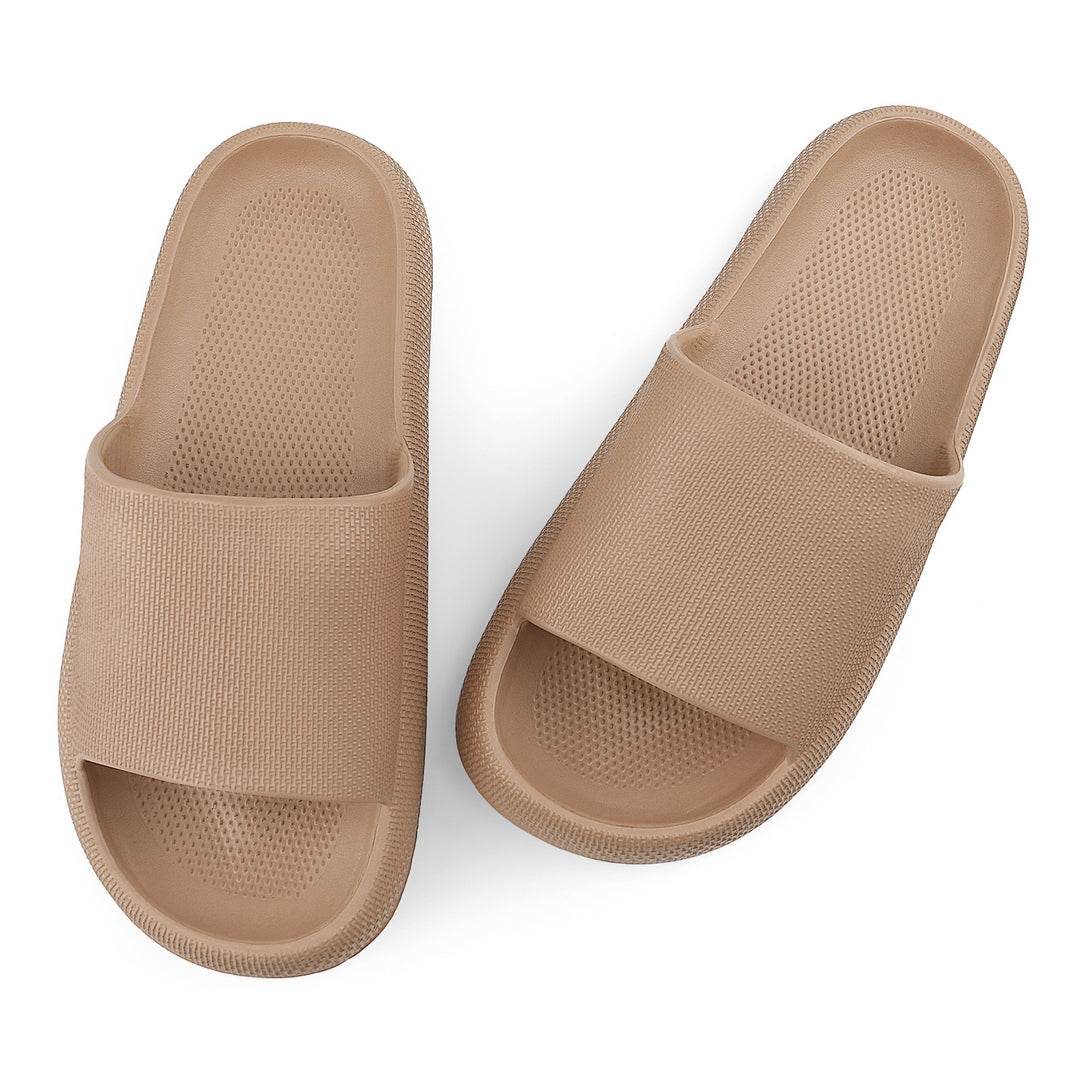Pair of beige slides on a white background#color_brown