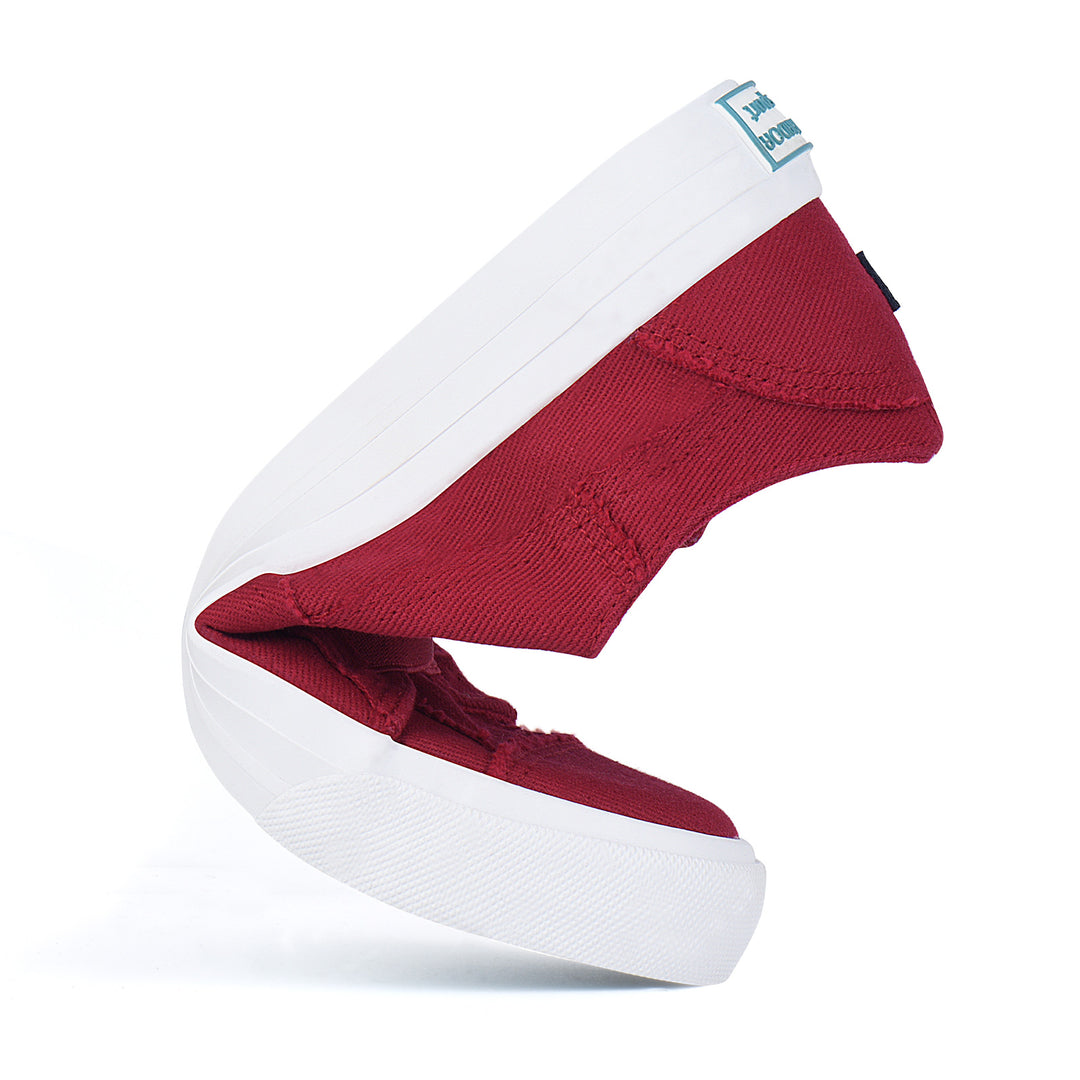 Red and white sneaker on a white background#color_red