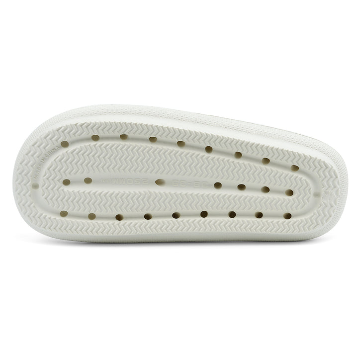 White shoe sole with small holes on a white background#color_white