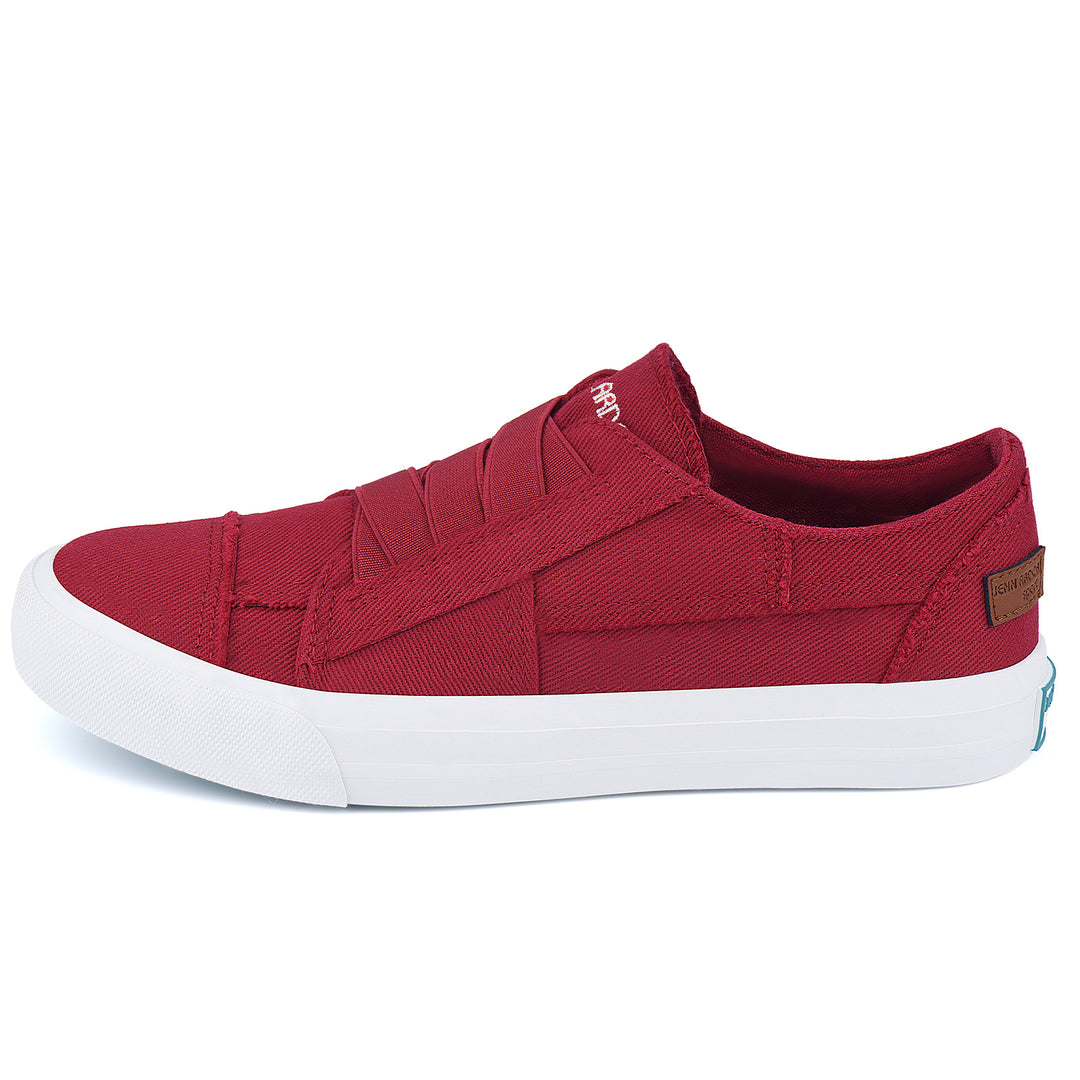Red slip-on sneaker with a white sole on a white background#color_red