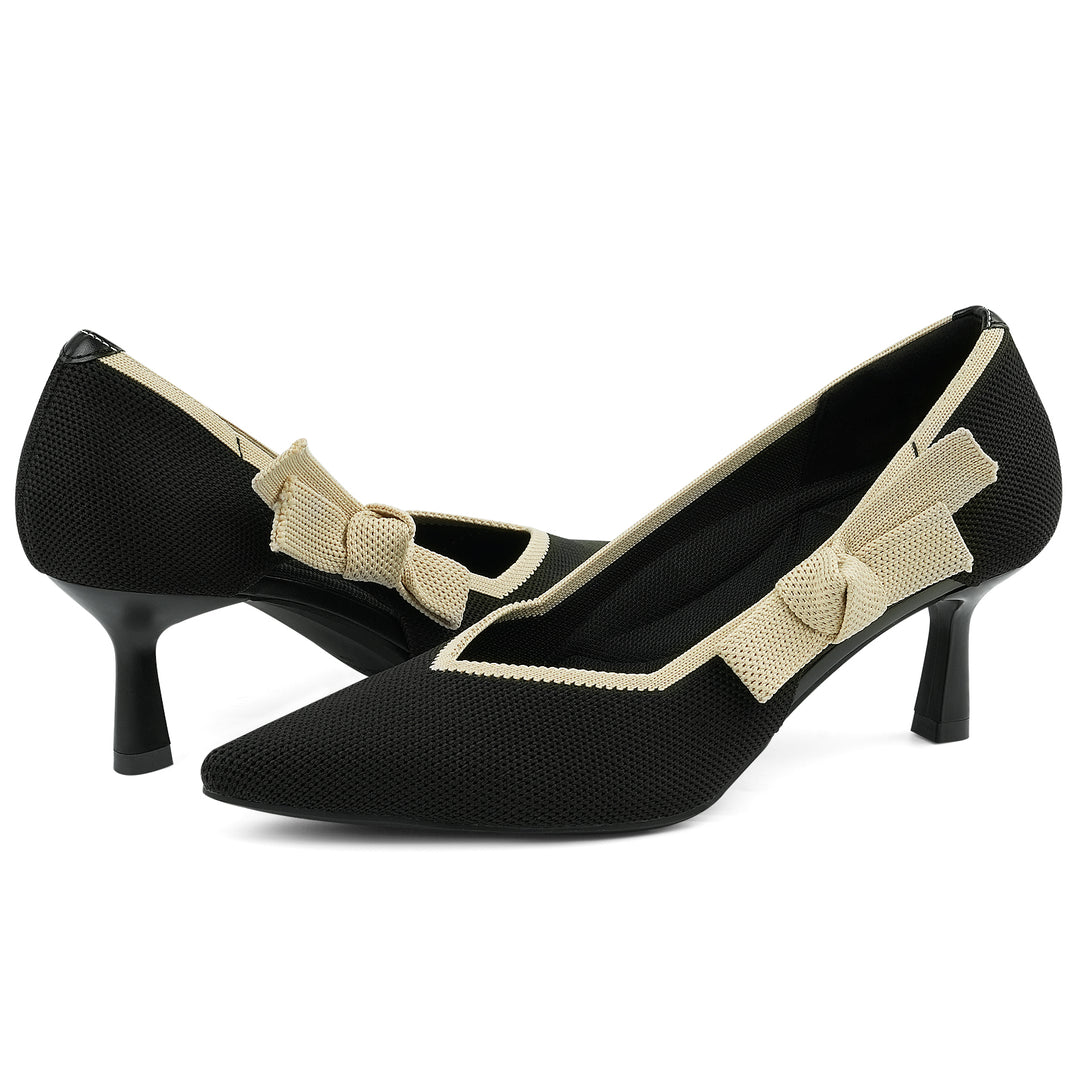 Black high-heeled shoes with beige bow details on a white background#color_black