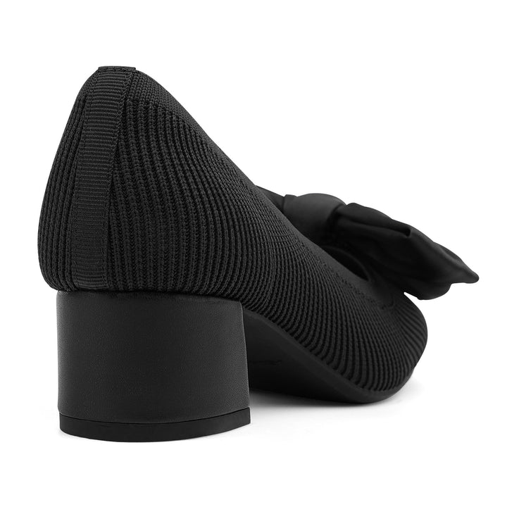 Black ribbed high heel shoes with a bow on a white background#color_black