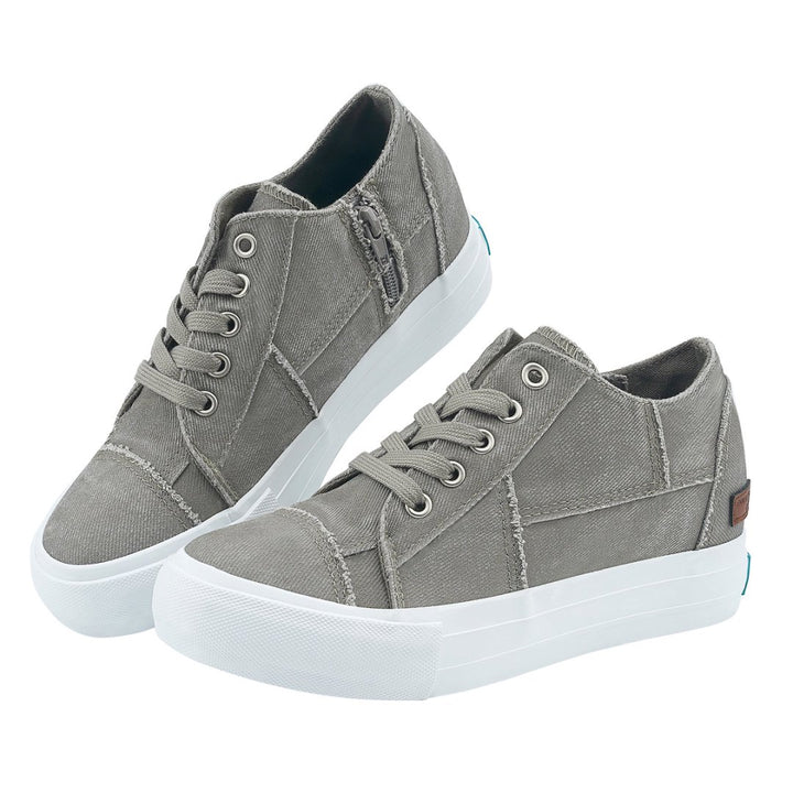 Pair of gray sneakers with white soles on a white background#color_grey1