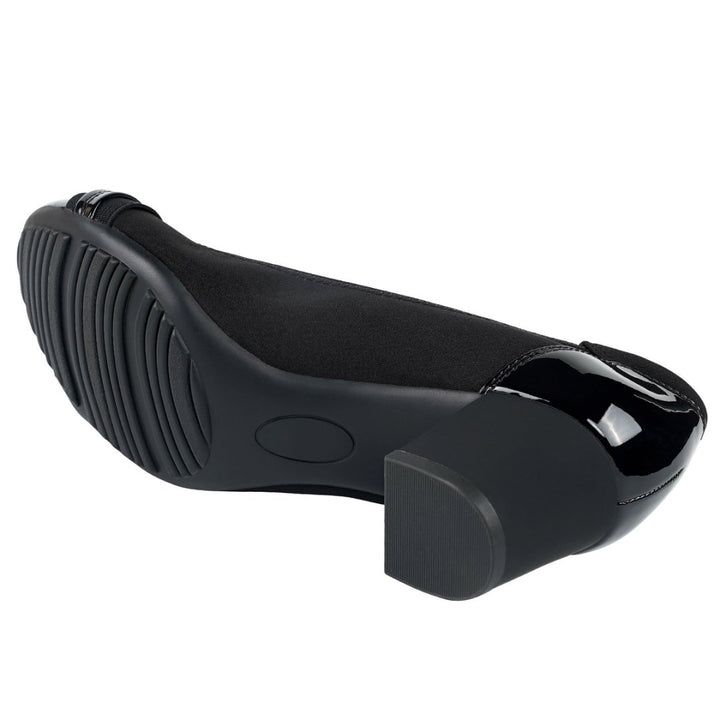 Black shoe sole with textured surface on a white background#color_black1
