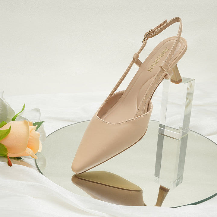 Side profile of pointed toe kitten heels#color_nude