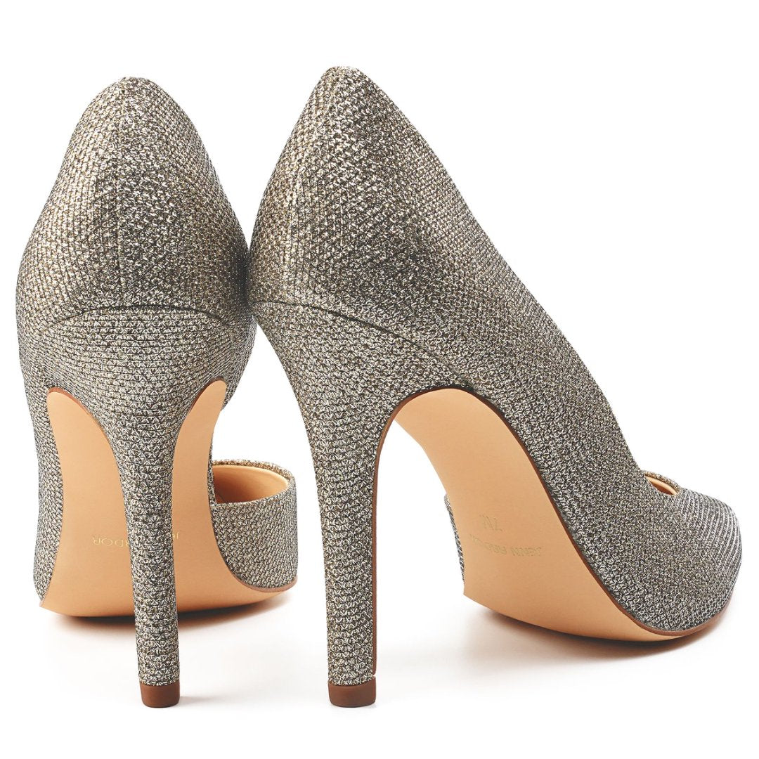 Pair of silver glitter high-heeled shoes on a white background#color_gold