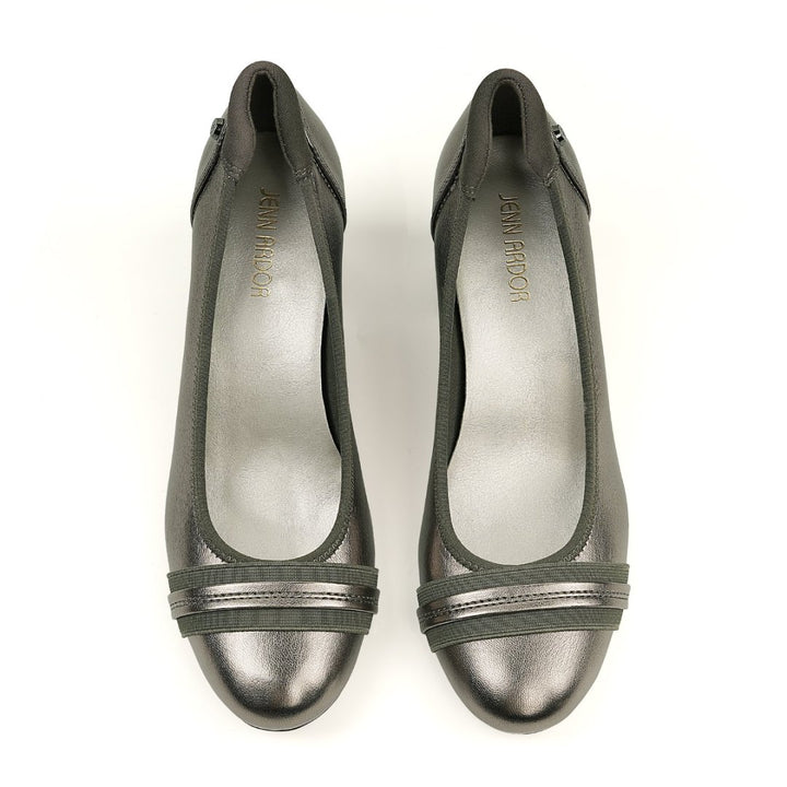 Pair of metallic silver shoes on a white background#color_pewter
