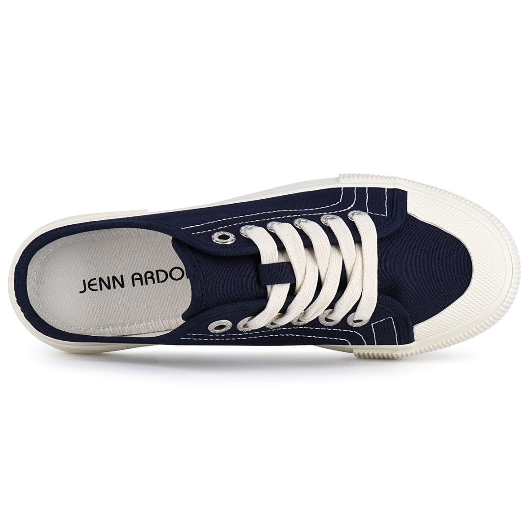 Navy blue sneaker with white laces on a white background#color_blue
