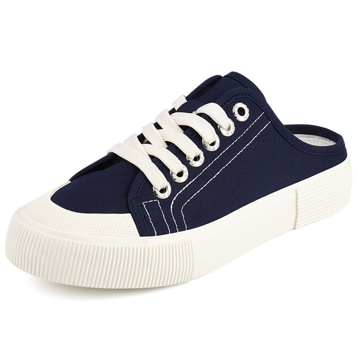 Navy blue sneaker with white laces on a white background#color_blue