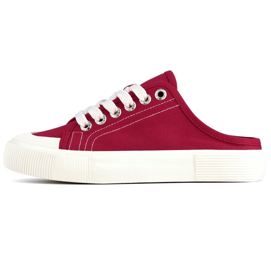 Red sneaker with white laces and sole on a white background#color_red