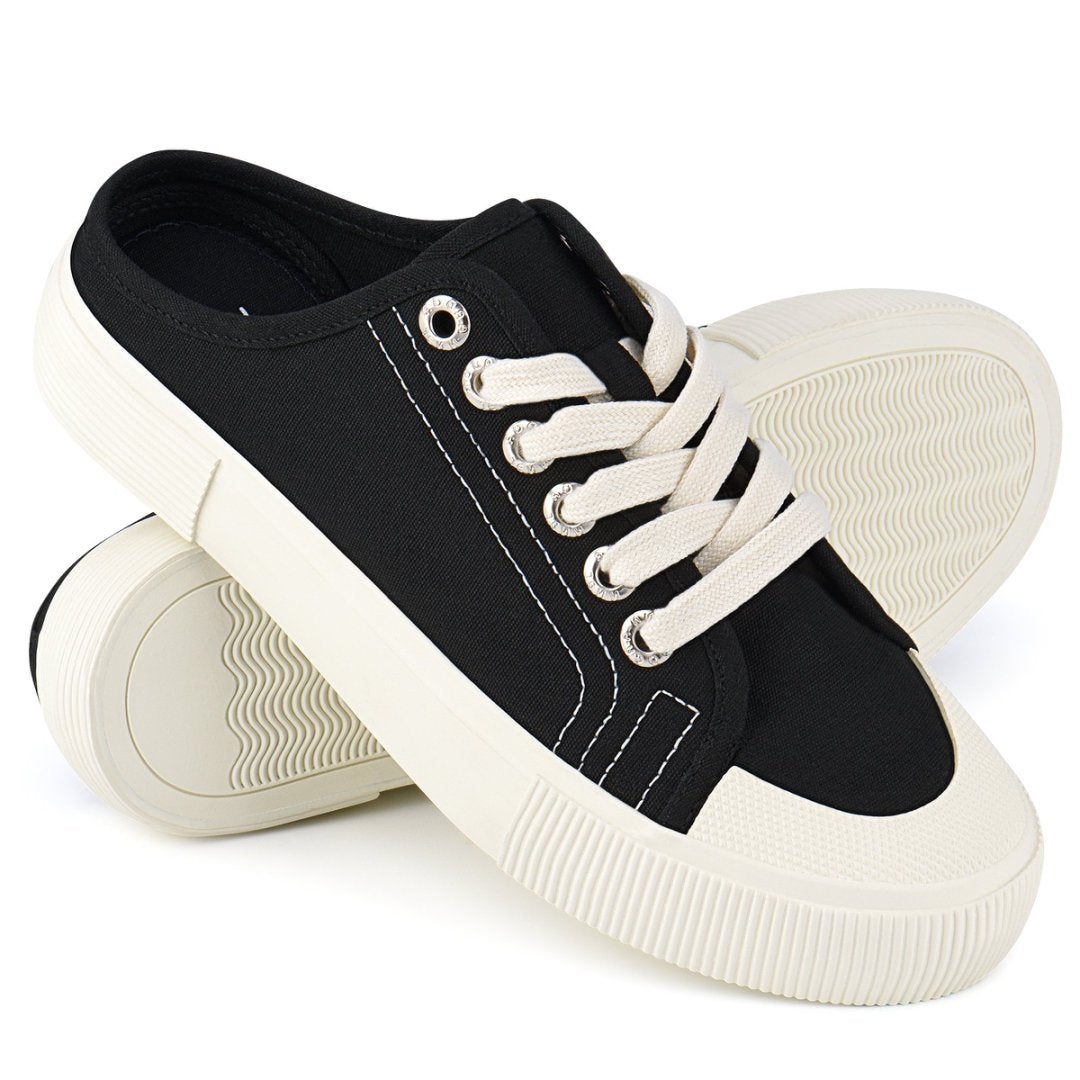 Black and white sneakers on a white background#color_black
