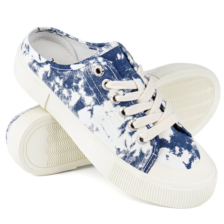 Pair of blue and white tie-dye sneakers on a white background#color_dark-blue-tie-dye