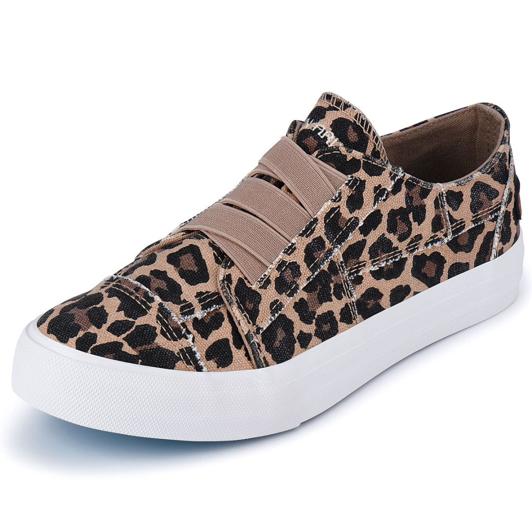 Leopard print sneaker with brown velcro straps on a white background#color_leopard