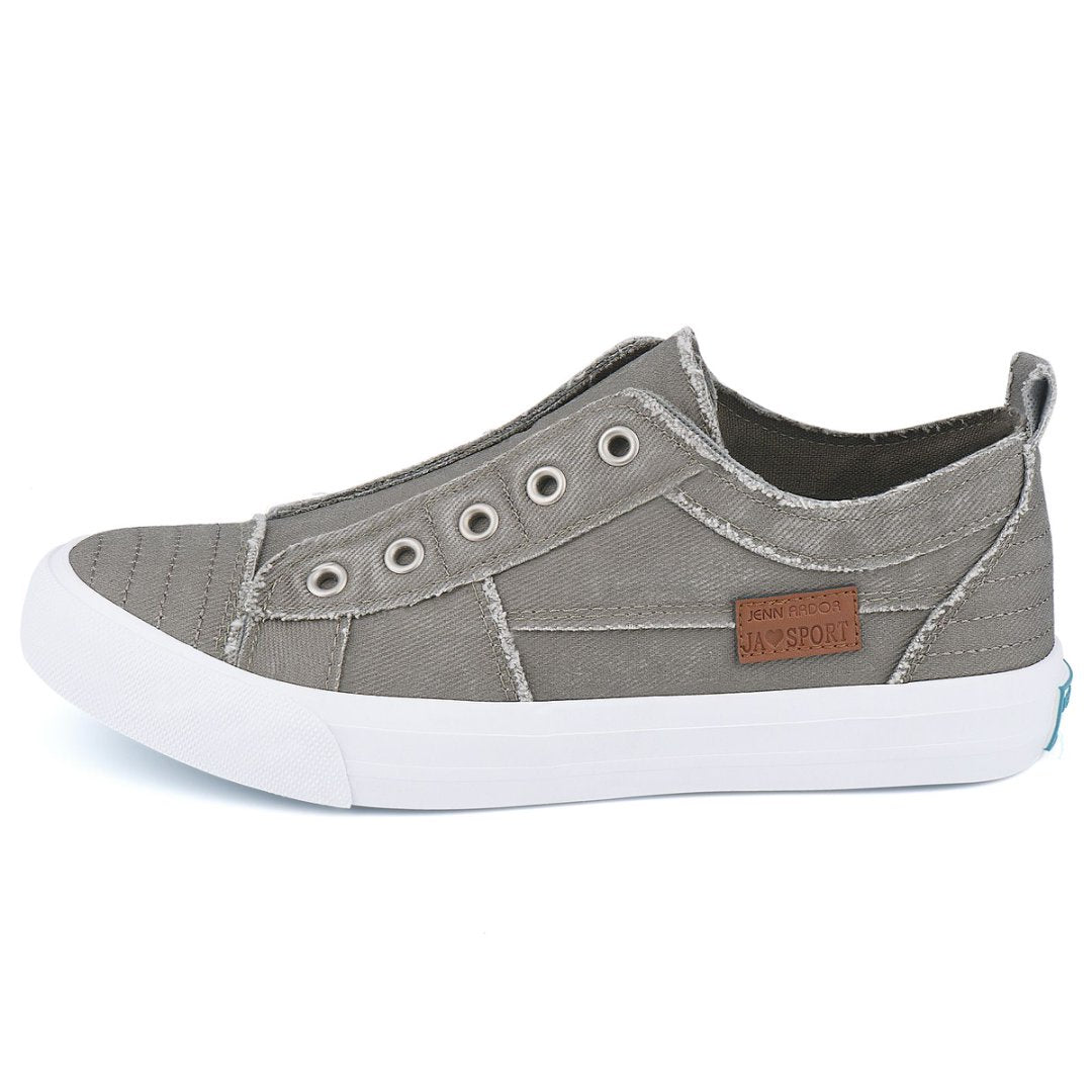 Gray slip-on sneaker with white sole on a white background#color_grey1