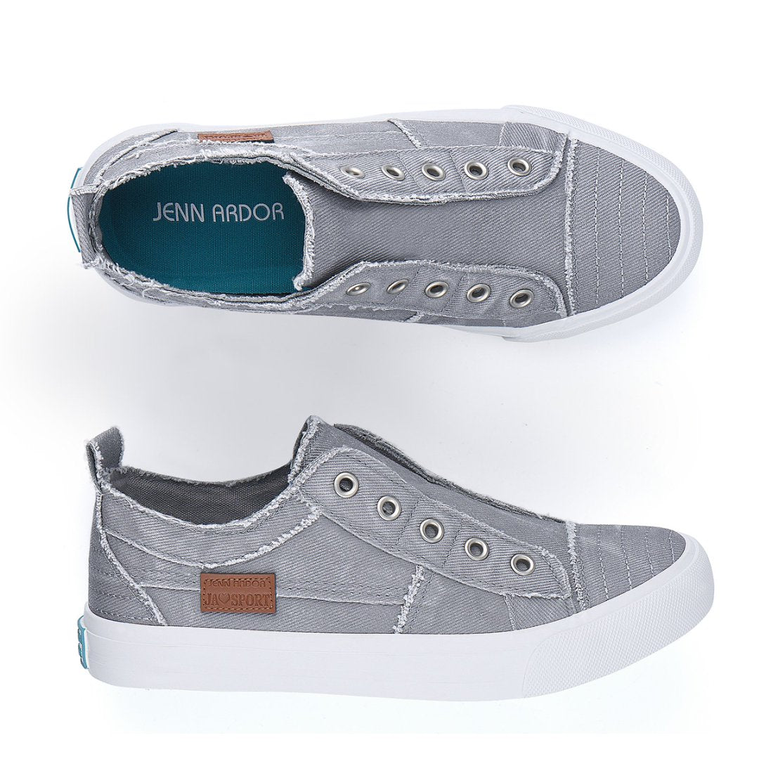 Gray sneakers with a visible brand logo on a white background#color_light-grey