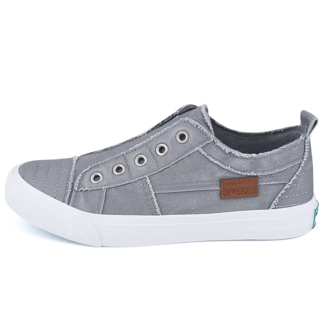 Gray casual shoe with a brand label on a white background#color_light-grey