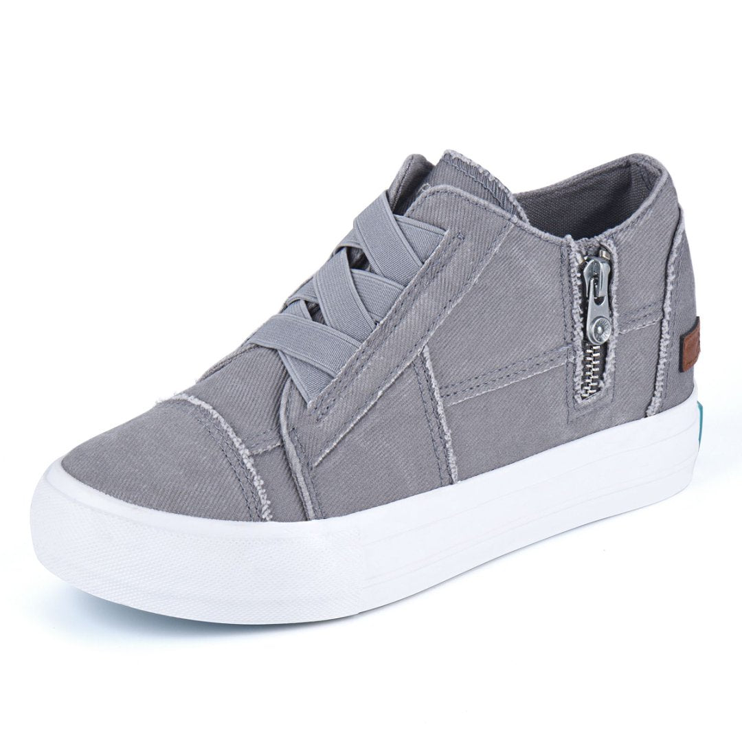 Gray casual shoe with a white sole on a white background#color_light-grey1
