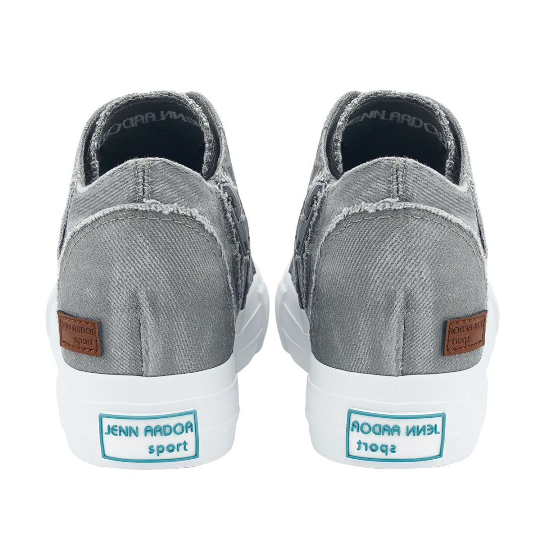 Gray slip-on sneakers with white soles and visible branding on a white background#color_light-grey1