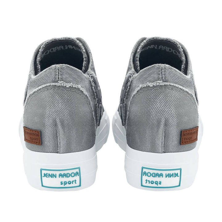 Gray slip-on sneakers with white soles and visible branding on a white background#color_light-grey1