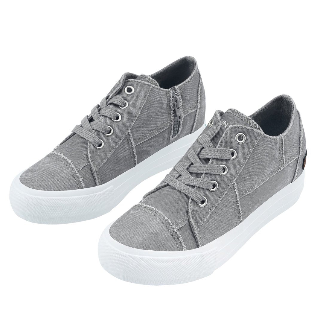 Pair of gray sneakers with white soles on a white background#color_light-grey1