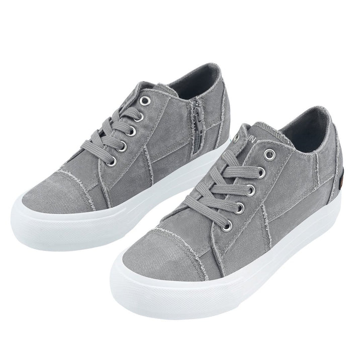 Pair of gray sneakers with white soles on a white background#color_light-grey1