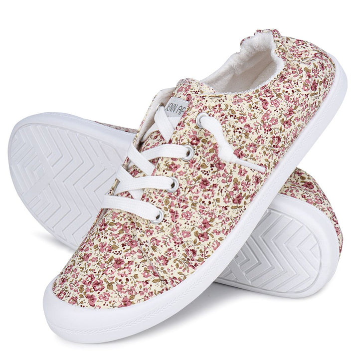 Floral patterned sneakers with white laces on a white background#color_flower