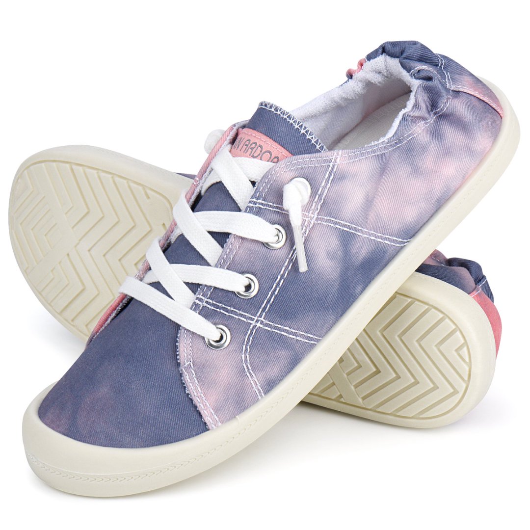 Pair of blue and pink sneakers with white laces on a white background#color_purple-pink-tie-dye