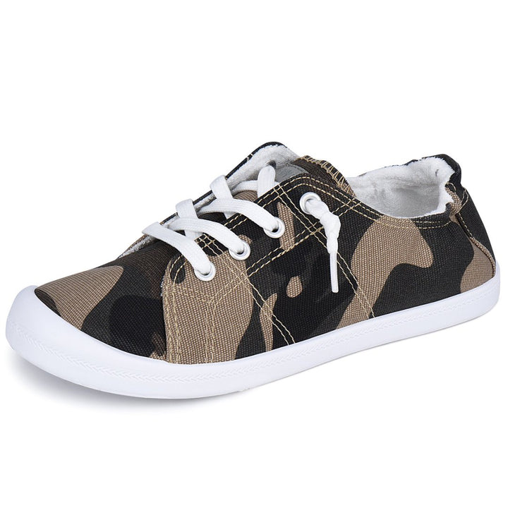 Camouflage-patterned sneaker with white laces on a white background#color_camo