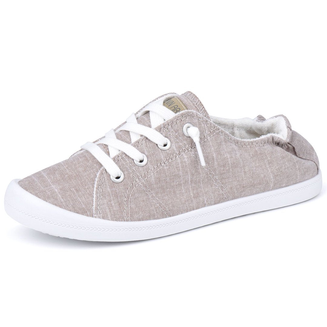 Gray casual shoe with white laces on a white background#color_light-grey