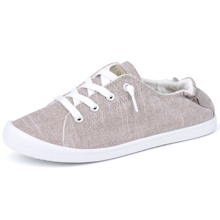 Gray casual shoe with white laces on a white background#color_light-grey