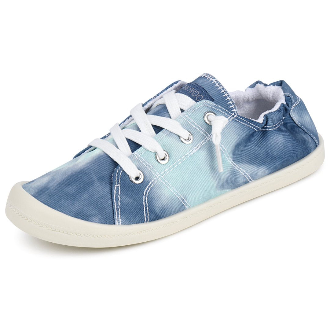 Blue denim sneaker with white laces on a white background#color_blue-tie-dye