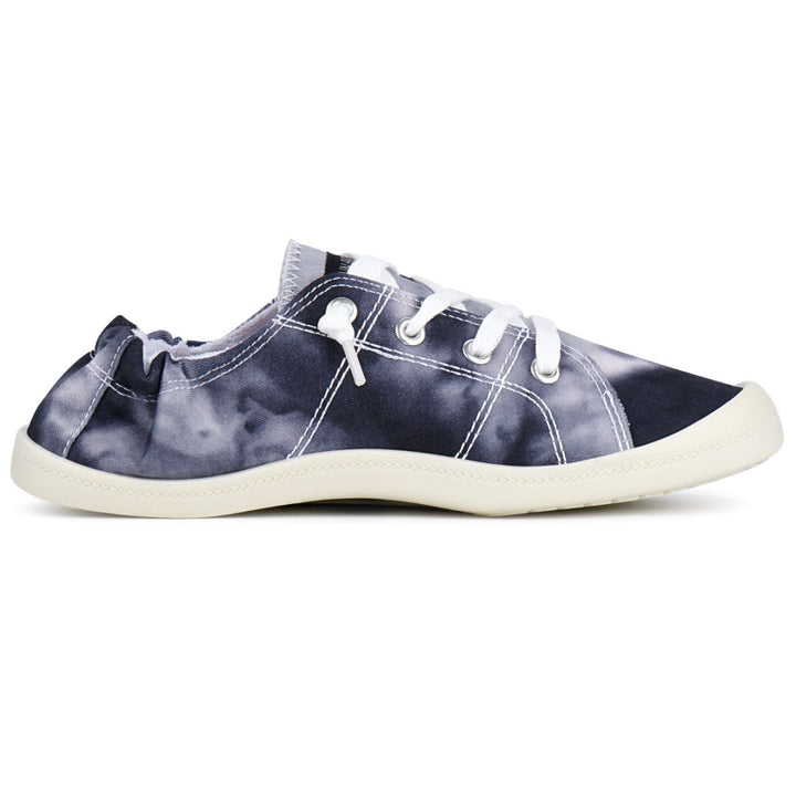 Navy tie-dye sneaker with white laces on a white background#color_black-tie-dye