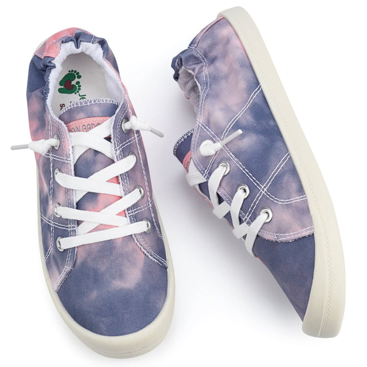 Pair of tie-dye sneakers with white laces on a white background#color_purple-pink-tie-dye