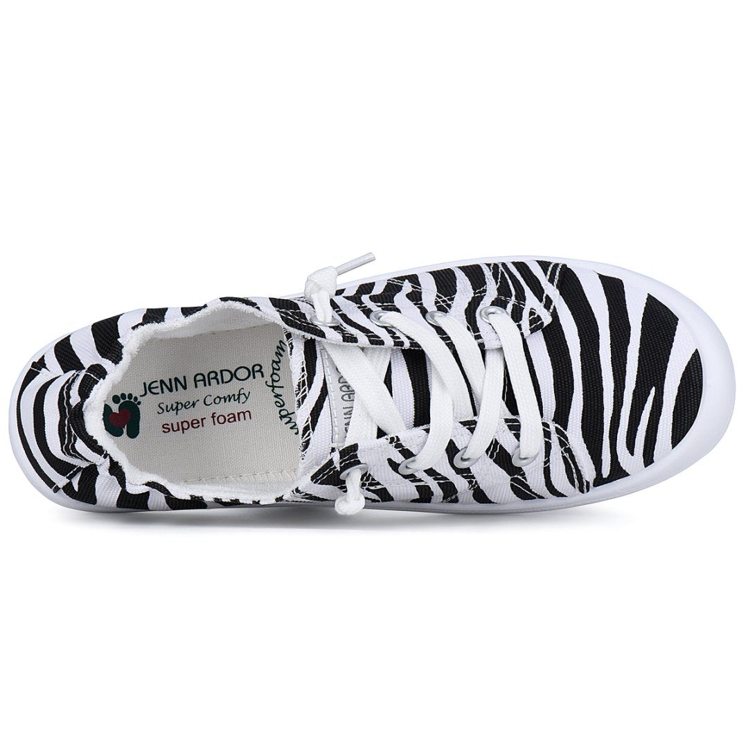 Zebra-patterned sneaker with visible brand name on a white background#color_zebra