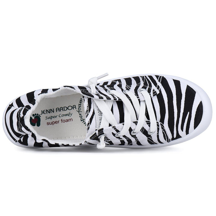 Zebra-patterned sneaker with visible brand name on a white background#color_zebra