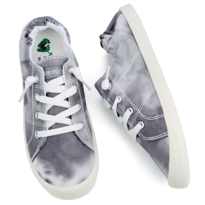 Pair of gray sneakers with white laces on a white background#color_grey-tie-dye