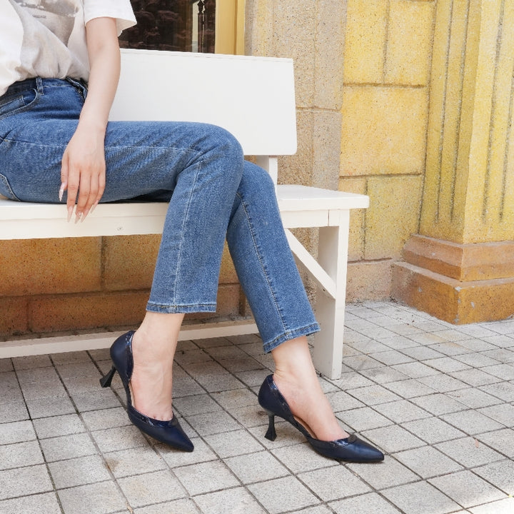 Navy pointed kitten heels styled for formal outfit#color_navy