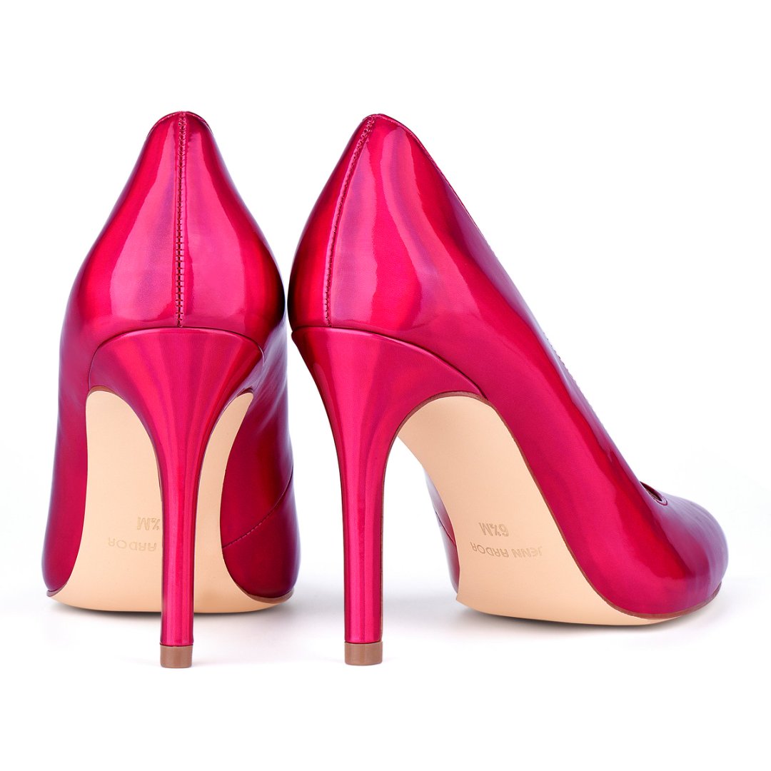 Pair of red high-heeled shoes on a white background#color_hot-pink