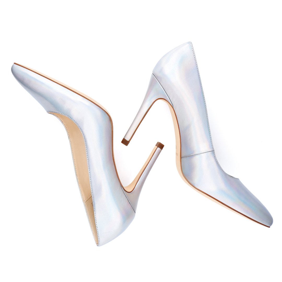 White high-heeled shoes with beige soles on a white background#color_light-blue