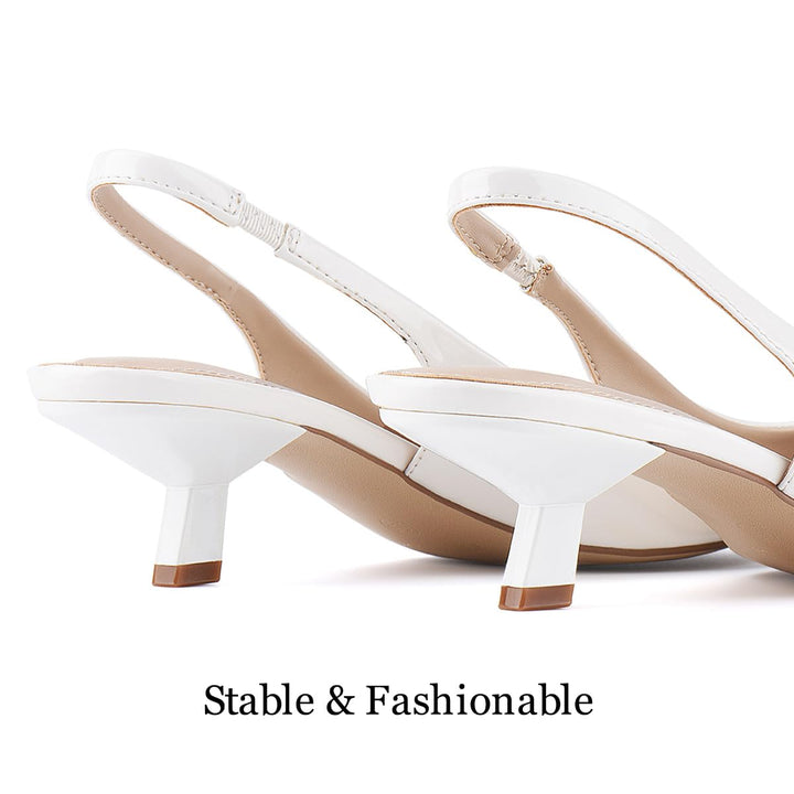 Back view showing elastic slingback and heel of pointed kitten pumps#color_cream-white