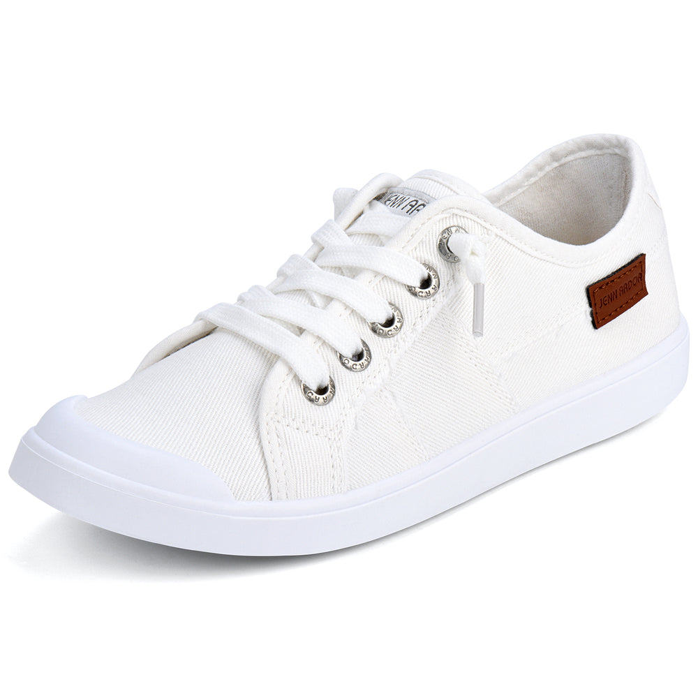 White canvas upper weave detail on JENN ARDOR slip-on sneakers#color_white