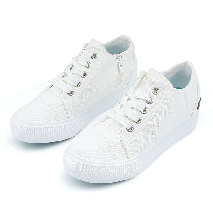 Pair of white sneakers on a white background#color_white1