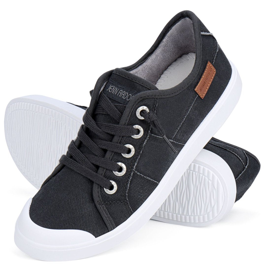 Black sneakers with white soles on a white background#color_dark-grey
