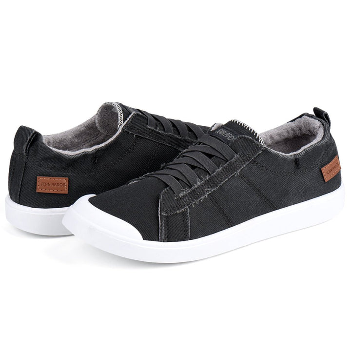 Black casual shoes with white soles on a white background#color_dark-grey