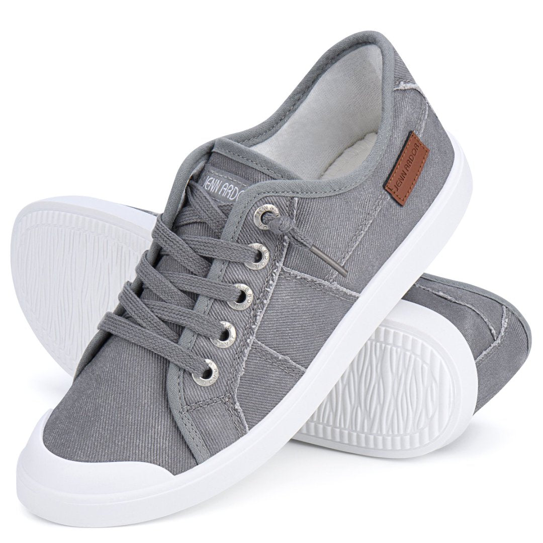 Gray sneakers with white soles on a white background#color_light-grey