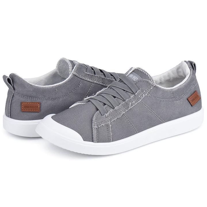 Gray sneakers with white soles on a white background#color_light-grey