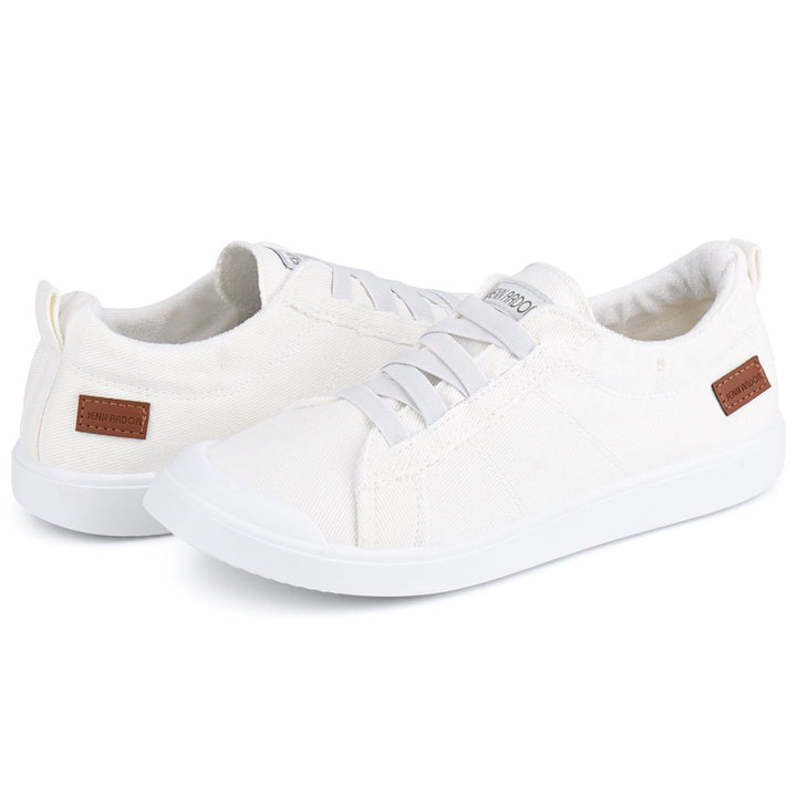 White sneakers with brown accents on a white background#color_white